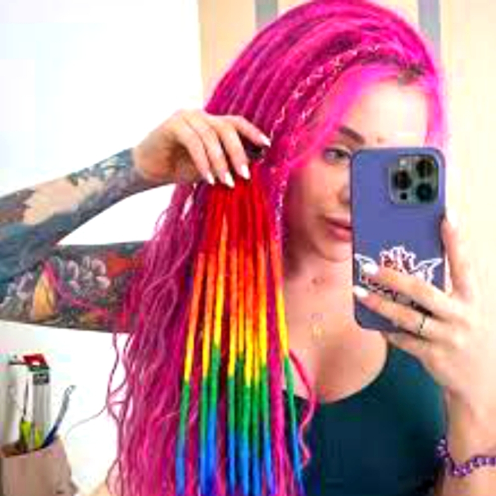 ON HOLD Your choice of a dreadlock ponytail by messy fairy $49 each